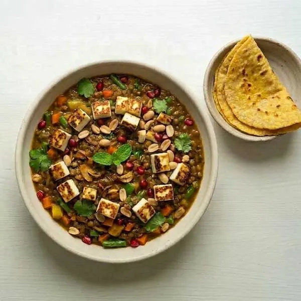 Vegetable and paneer dhansak with maki ka roti
